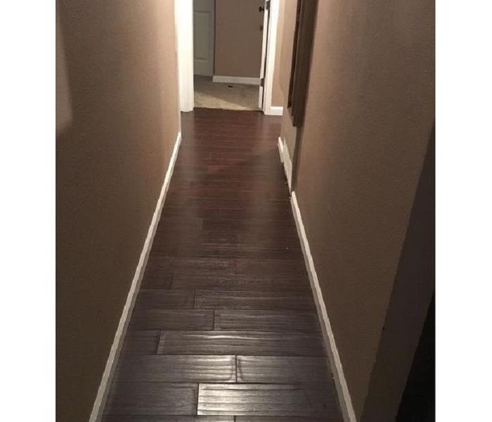 Flooring with water damage in Fort Worth