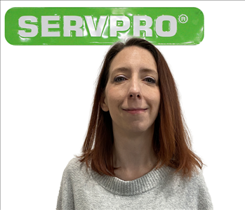 Jessica, female, SERVPRO employee against a white background and green SERVPRO logo