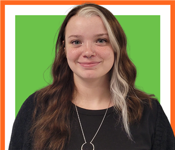 Abby, SERVPRO employee cutout against a green background