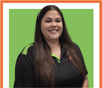 hany, female, SERVPRO employee against a white background and green SERVPRO logo