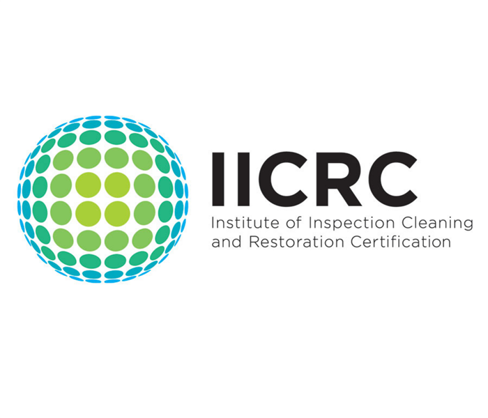 IICRC logo, blue dots forming a circle, SERVPRO standard